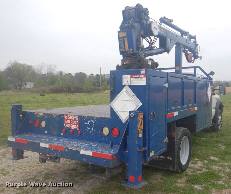 image for item GF9133 2007 Ford F550 Super Duty flatbed truck with crane