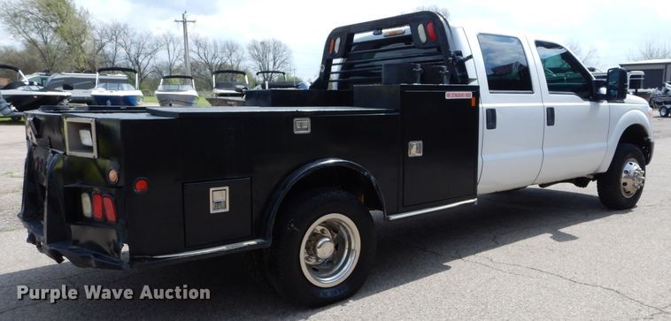 image for item GK9105 2013 Ford F350 Super Duty  Crew Cab flatbed pickup truck