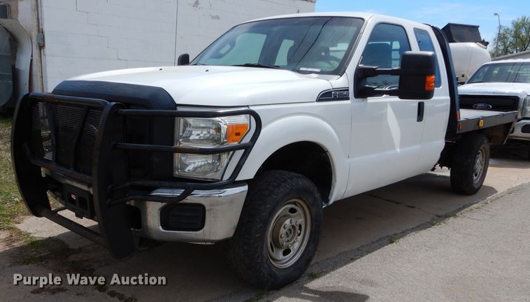 image for item GK9129 2014 Ford F250 Super Duty  SuperCab flatbed pickup truck