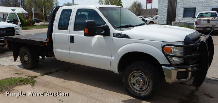 image for item GK9129 2014 Ford F250 Super Duty  SuperCab flatbed pickup truck