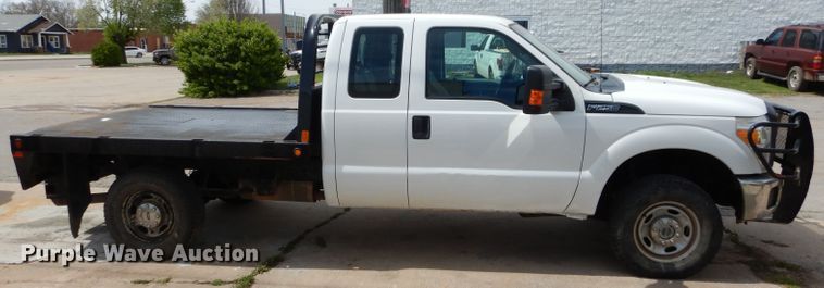 image for item GK9129 2014 Ford F250 Super Duty  SuperCab flatbed pickup truck