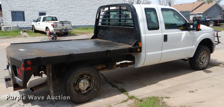 image for item GK9129 2014 Ford F250 Super Duty  SuperCab flatbed pickup truck