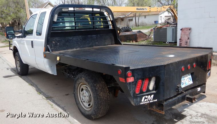 image for item GK9129 2014 Ford F250 Super Duty  SuperCab flatbed pickup truck