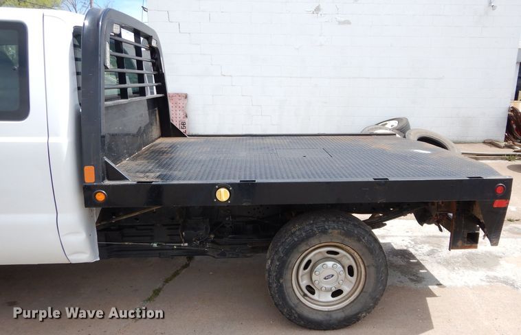 image for item GK9129 2014 Ford F250 Super Duty  SuperCab flatbed pickup truck