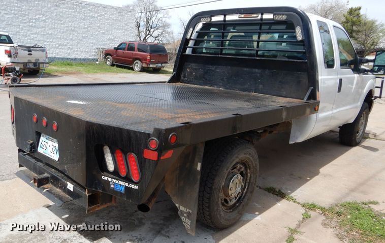 image for item GK9129 2014 Ford F250 Super Duty  SuperCab flatbed pickup truck