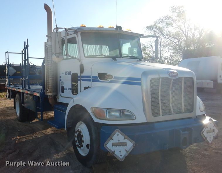 image for item HC9009 2005 Peterbilt PB335 flatbed truck
