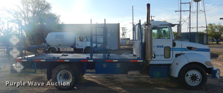 image for item HC9009 2005 Peterbilt PB335 flatbed truck