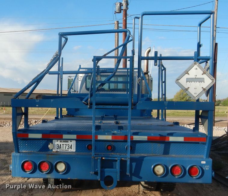 image for item HC9009 2005 Peterbilt PB335 flatbed truck