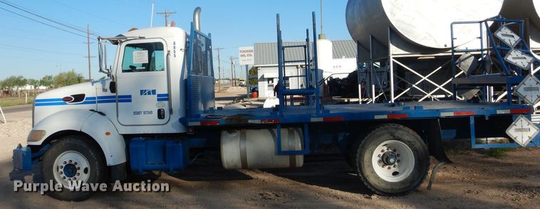 image for item HC9009 2005 Peterbilt PB335 flatbed truck