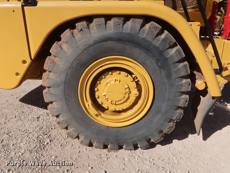 image for item DG7124 2008 Caterpillar 725  water wagon