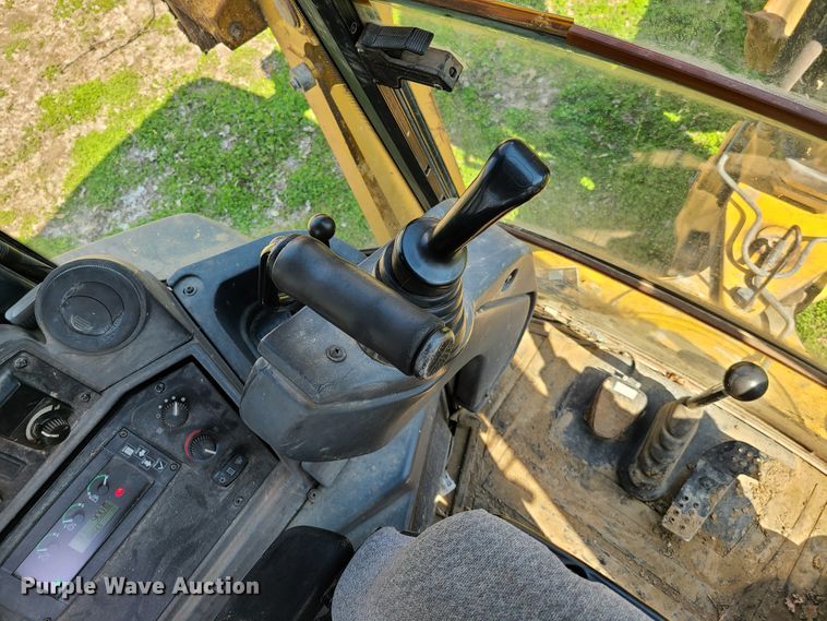 image for item EL9803 2010 John Deere 710J  backhoe