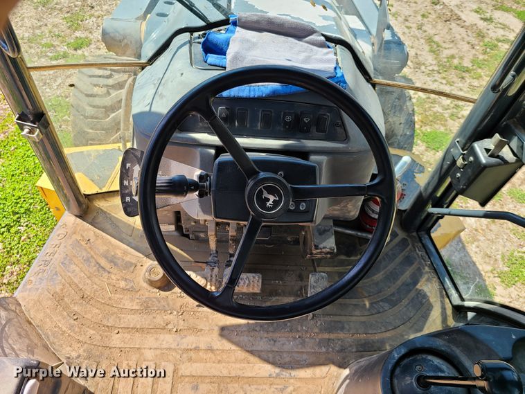 image for item EL9803 2010 John Deere 710J  backhoe