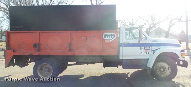 image for item FR9521 1998 Ford F700 chipper bed truck