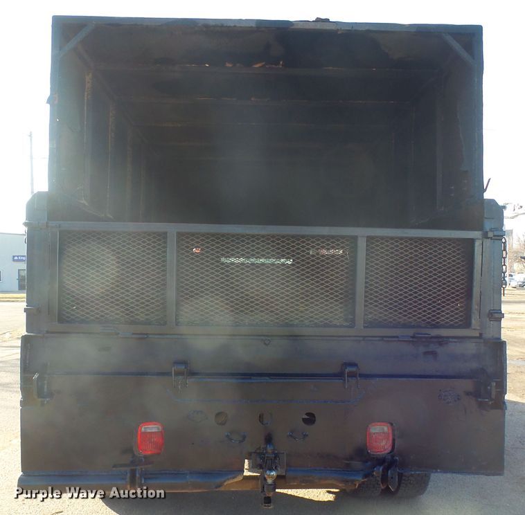 image for item FR9521 1998 Ford F700 chipper bed truck