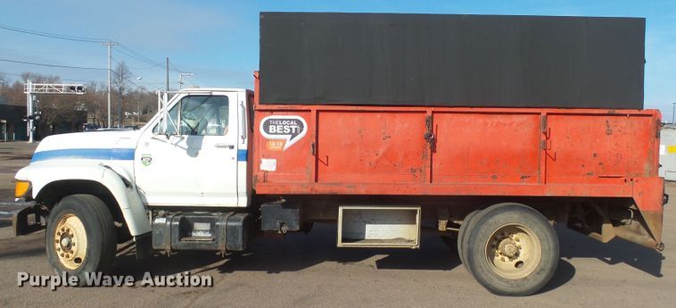 image for item FR9521 1998 Ford F700 chipper bed truck