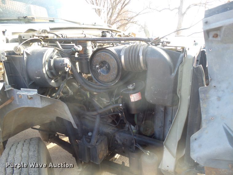 image for item FR9521 1998 Ford F700 chipper bed truck