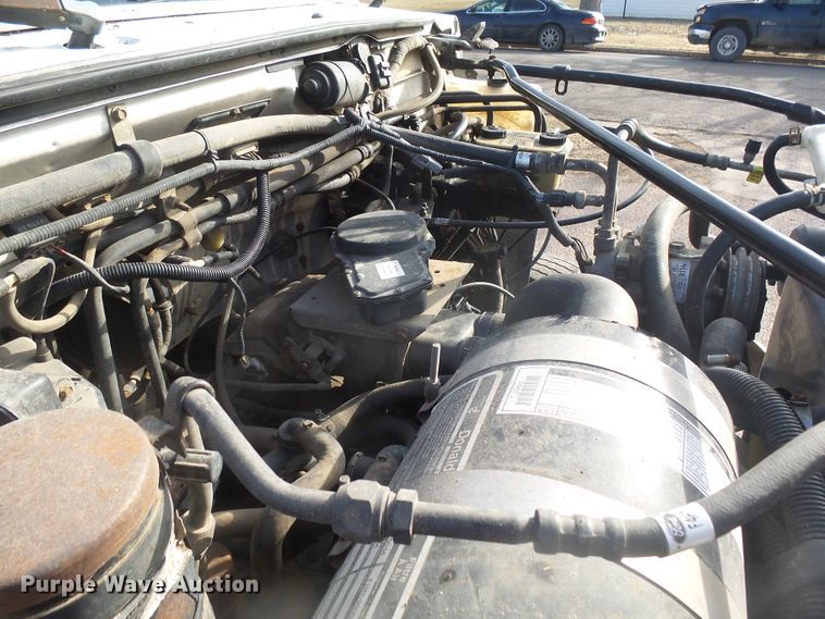 image for item FR9521 1998 Ford F700 chipper bed truck