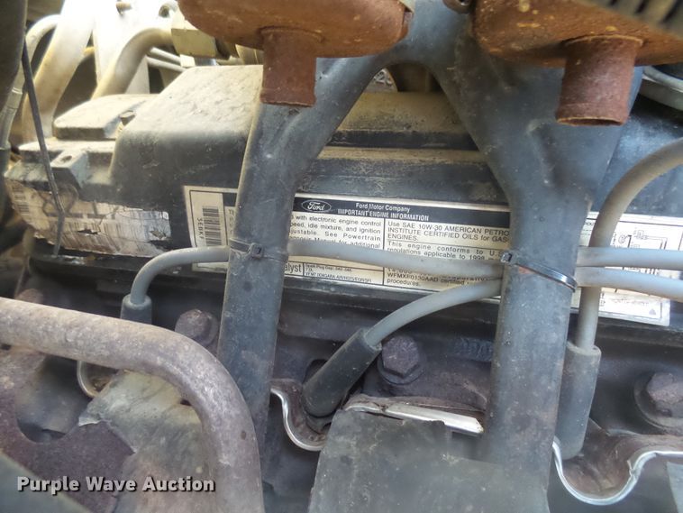 image for item FR9521 1998 Ford F700 chipper bed truck