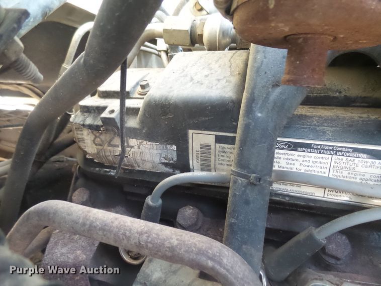 image for item FR9521 1998 Ford F700 chipper bed truck