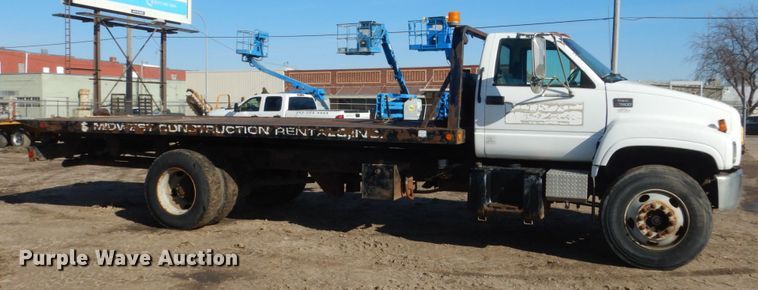 image for item FX9048 1999 GMC C7500 rollback truck