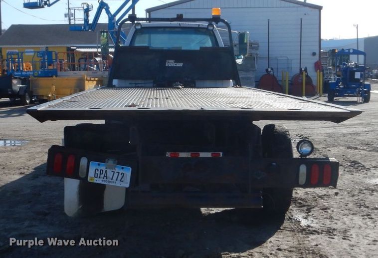 image for item FX9048 1999 GMC C7500 rollback truck