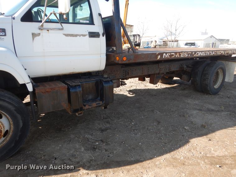 image for item FX9048 1999 GMC C7500 rollback truck