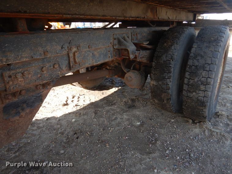 image for item FX9048 1999 GMC C7500 rollback truck