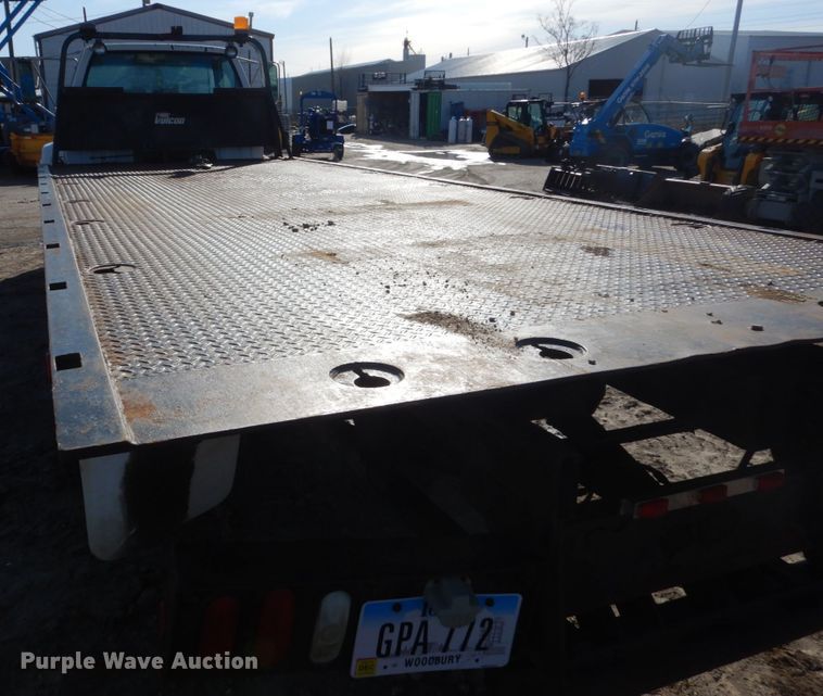 image for item FX9048 1999 GMC C7500 rollback truck