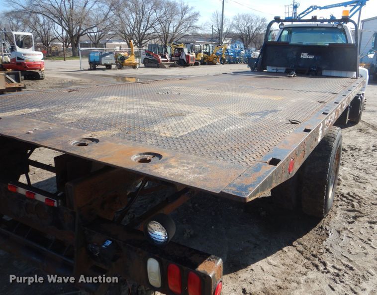 image for item FX9048 1999 GMC C7500 rollback truck