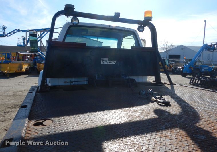 image for item FX9048 1999 GMC C7500 rollback truck