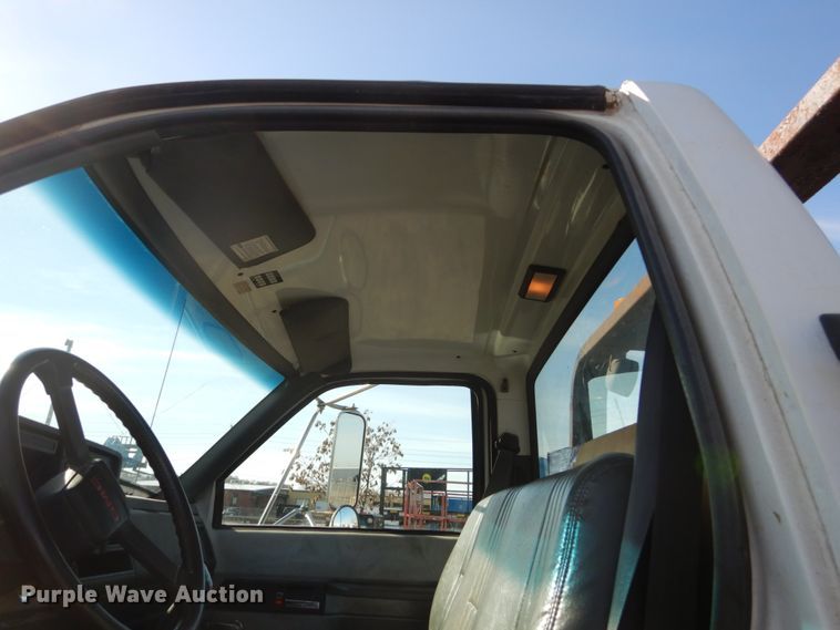 image for item FX9048 1999 GMC C7500 rollback truck