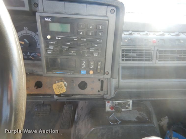 image for item FX9048 1999 GMC C7500 rollback truck