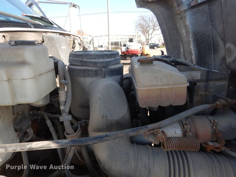 image for item FX9048 1999 GMC C7500 rollback truck