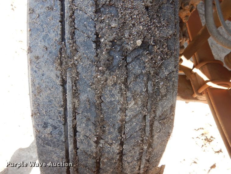 image for item FX9048 1999 GMC C7500 rollback truck