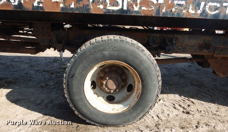 image for item FX9048 1999 GMC C7500 rollback truck