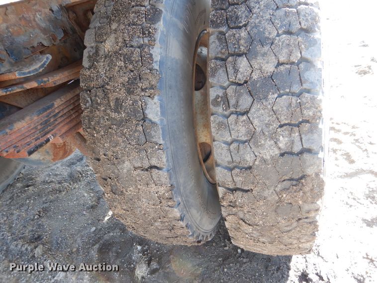 image for item FX9048 1999 GMC C7500 rollback truck