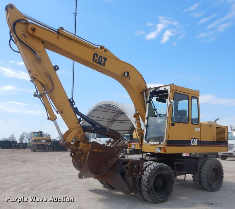image for item GP9029 1986 Caterpillar 212 rubber tired excavator