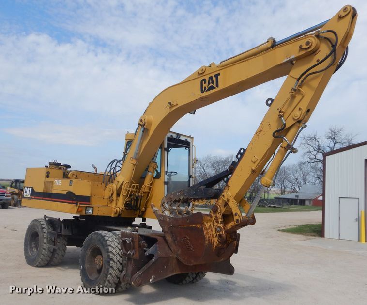 image for item GP9029 1986 Caterpillar 212 rubber tired excavator