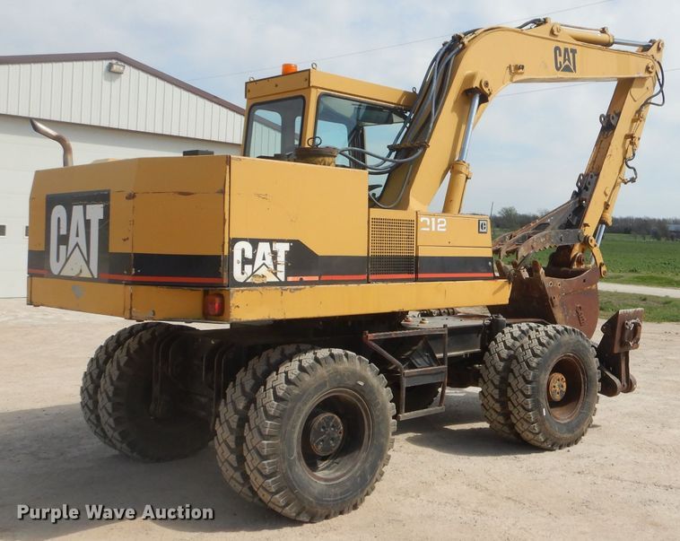 image for item GP9029 1986 Caterpillar 212 rubber tired excavator