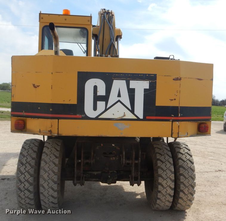 image for item GP9029 1986 Caterpillar 212 rubber tired excavator