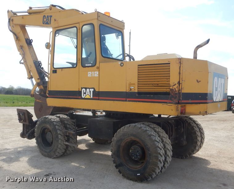 image for item GP9029 1986 Caterpillar 212 rubber tired excavator
