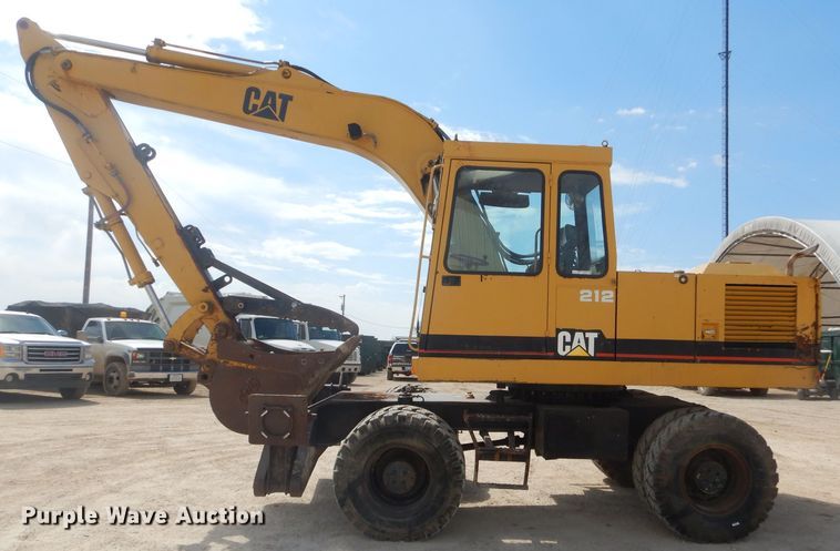 image for item GP9029 1986 Caterpillar 212 rubber tired excavator