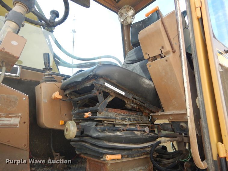 image for item GP9029 1986 Caterpillar 212 rubber tired excavator