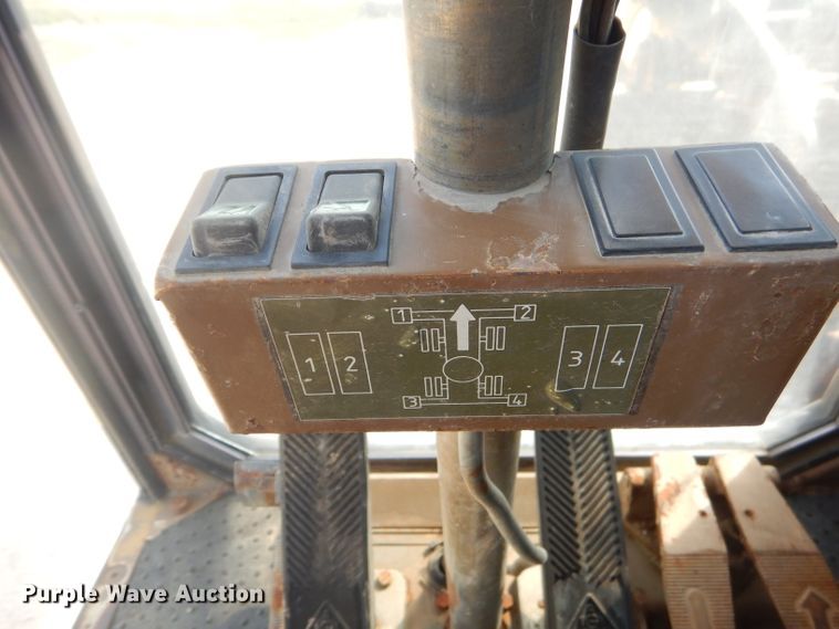 image for item GP9029 1986 Caterpillar 212 rubber tired excavator