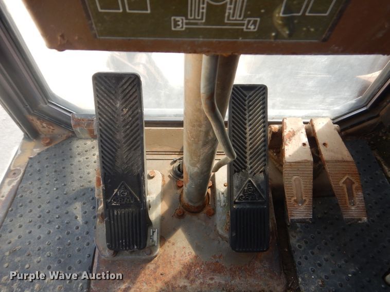 image for item GP9029 1986 Caterpillar 212 rubber tired excavator