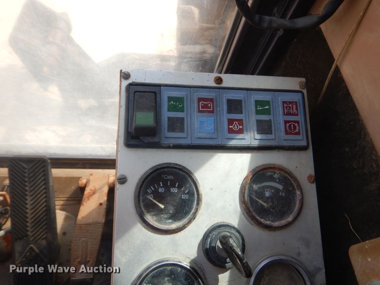 image for item GP9029 1986 Caterpillar 212 rubber tired excavator