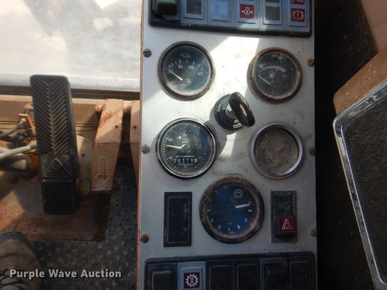 image for item GP9029 1986 Caterpillar 212 rubber tired excavator