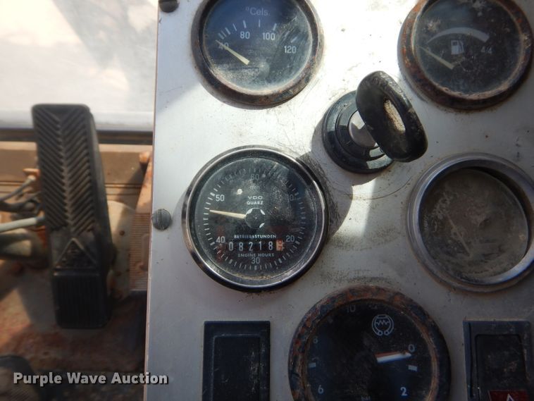 image for item GP9029 1986 Caterpillar 212 rubber tired excavator