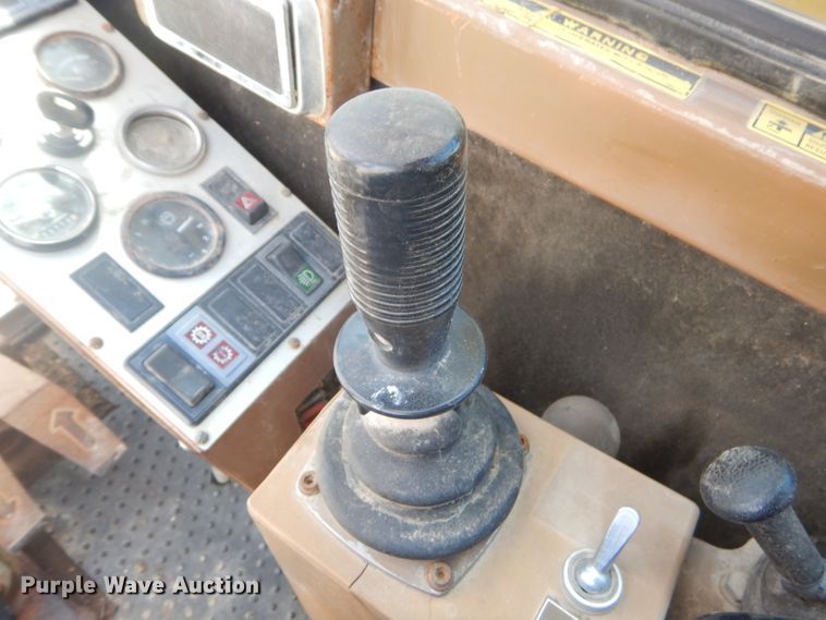 image for item GP9029 1986 Caterpillar 212 rubber tired excavator