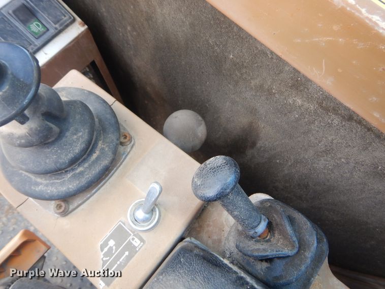 image for item GP9029 1986 Caterpillar 212 rubber tired excavator